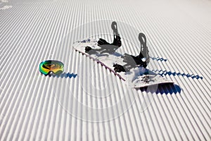 Equipment for snowboarding on a new groomed snow