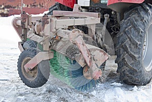 Equipment on the tractor for cleaning the road