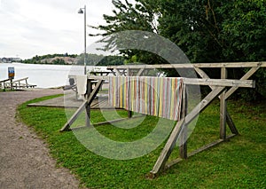 Equipment for washing, wringing and drying carpets in a residential area on the seafront in Helsinki.