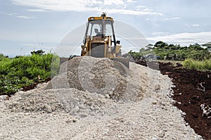 Equipment At Work Spreading Marl