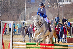 Equitation little girl horseback rider