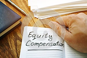 Equity compensation words in the notebook.