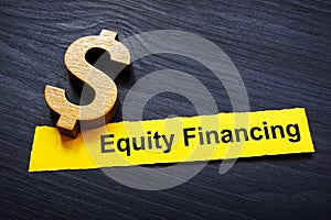 Equity financing. Dollar sign and inscription on a piece of paper.