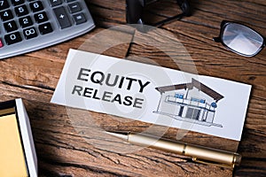 Equity Release Text On Paper Near Office Supplies