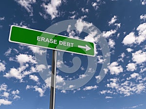 Erase debt traffic sign on blue sky