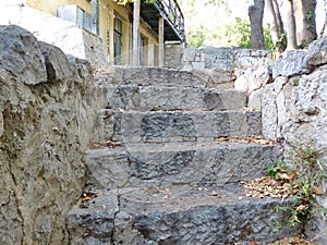 Erased steps of old stone stairs in the park of the Yusupov Palace.
