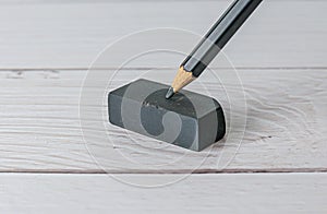 Eraser and error concept, Eraser and pencil on white table