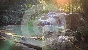 Erawan Falls with a bunch of fish in the water is a famous waterfall of Kanchanaburi