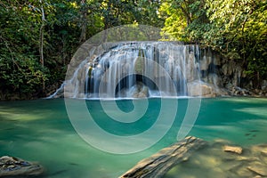 Erawan Waterfall with fish in water