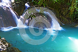 Erawan Waterfall with green water in natural