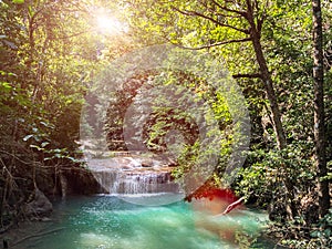 Erawan Waterfall in Kanchanaburi, Thailand. Landscape of Waterfall Crashing Big Stone on The Clear Natural Water in The Jungle