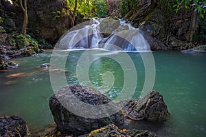 Erawan waterfall is one of the most popular falls in Thailand.