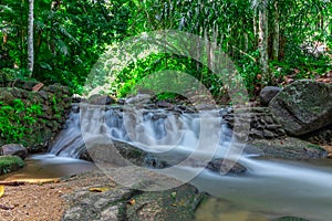 Erawan waterfalls in the national park mountains of Kanchanaburi BKK Bangkok Thailand lovely turquoise blue creamy waters photo