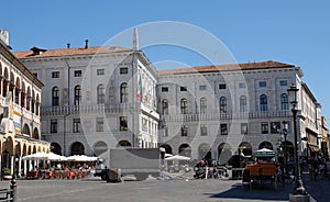 Erbe Square illuminated by the sun and under the blue sky, in the center of Padua in the Veneto (Italy)
