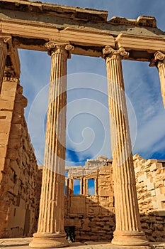 Erechtheion (Erechtheum) or Temple of Athena Polias is ancient Greek Ionic temple on north side of Acropolis in Athens