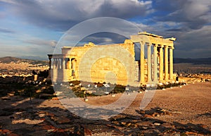 Erechtheion temple in Athens during the sunrise. Ruins of the Temple of Erechtheion and Temple of Athene at the Acropolis hill in