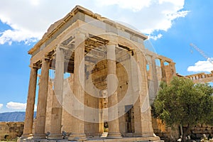 Erechtheum temple ruins on the Acropolis in a summer day in Athens, Greece