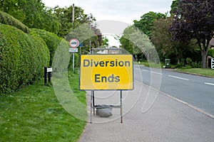 Erected traffic Diversion Sign seen in at the beginning of a village high street.