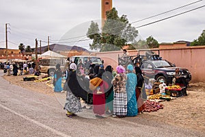 Erfoud, Morocco - Oct 19, 2019: local residents at the Road of a Thousand Kasbahs in their activities on the streets