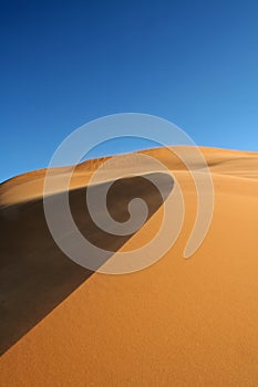 Erg Chebbi sand dunes and sand photo