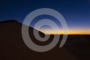 Sunset over Erg Chegaga, Morocco photo