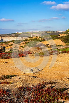 Ericeira Milreu Fort on arid landscape on a sunny day, in Portugal