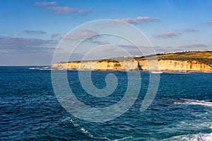 Ericeira sea cliffs at sunset in Portugal