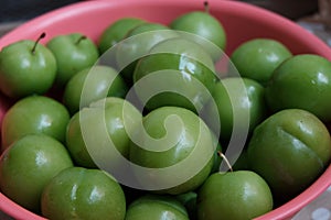 Erik, or greengages, often called sour green plums, eaten in Turkey.