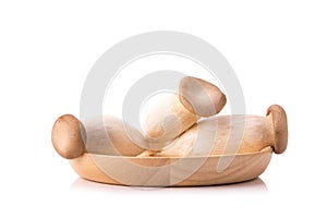 Eringi mushrooms on wooden bolw