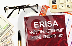 The ERISA Employee Retirement Security Act. Text inscription on the book.