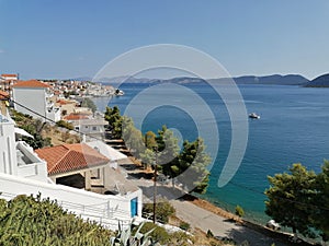 Ermioni greece, houses and sea. white houses, blue sea and sky. Peleponnese