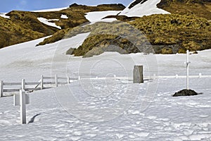 Ernest Shackleton\'s funerary stele under snow, Grytviken cemetery, South Georgia and the Sandwich Islands, Antarctica
