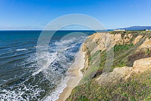 Eroded cliffs and sandy beach, Pacific Ocean, Half Moon Bay, California