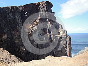 Eroded eruptive structures shaping a cliff on Madeira