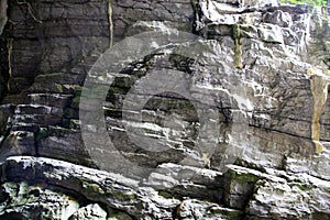 Eroded, fractured and layered stone wall, Morigerati, Cilento, Italy