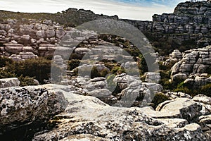 Eroded limestone mountain rock strata photo