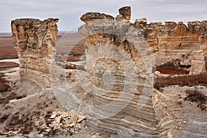 Eroded limestone pillars and stacks in badlands