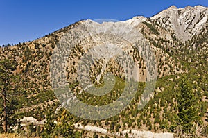 Eroded mountainside and talus slope photo