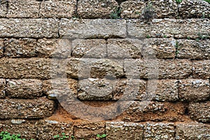 Eroded stone wall as background in Athens, Greece