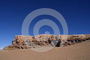 Eroded Stone Wall in Desert