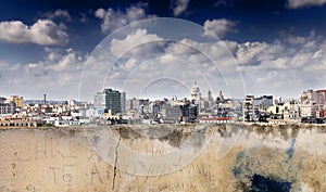 Eroded wall and havana skyline photo