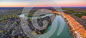 Eroding sandstone shores of Murray RIver at dusk. photo