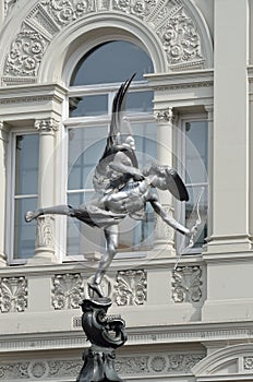 Eros statue with arch