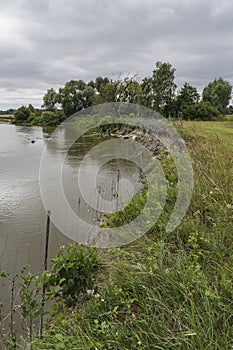 Erosion on the bank of a meandering river Bug