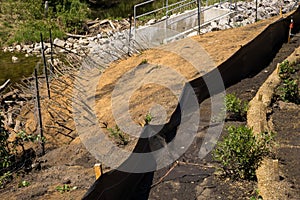 Erosion control elements applied to the slope landscaping project photo