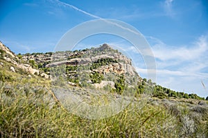 Erosion on the rock and Mount Arabi, Yecla, Murcia, Spain photo