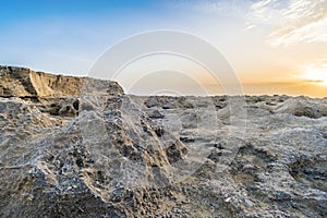 Erosion on the rocky surface, sunset with view on rocky ciffs. photo