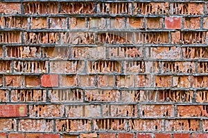 erosion, weathering and eolation of red brick walls