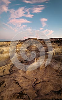 Erosional arid features in the Valley of the Moon at sunset. Vertical panoramic view