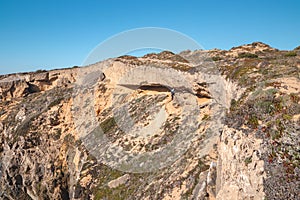 Erosional effects on a cliff on the Atlantic coast near Vila Nova de Milfontes, Odemira, Portugal. In the footsteps of Rota photo